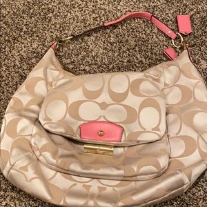 coach shoulder bag with pink accents